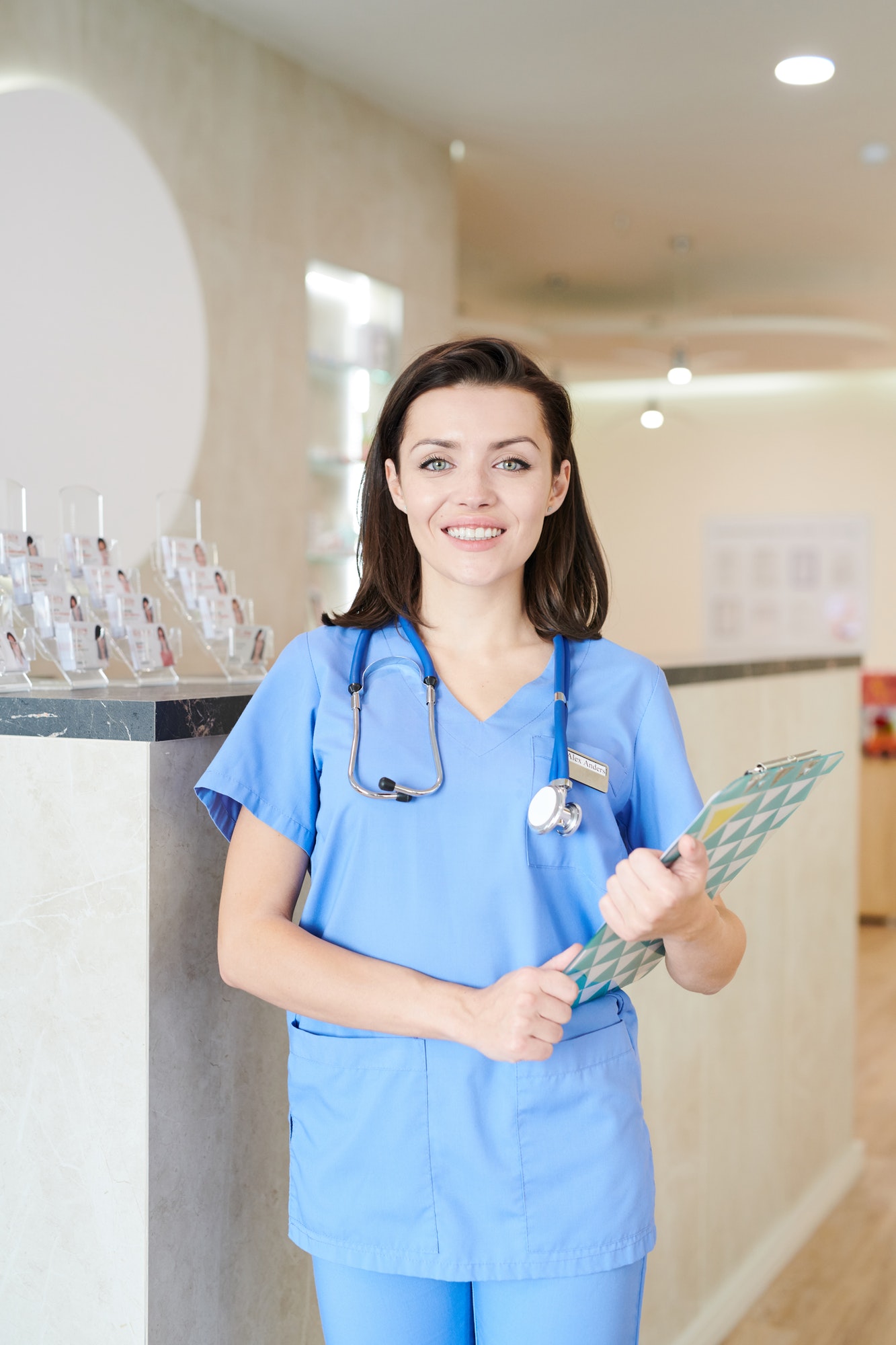 female-nurse-posing-in-clinic.jpg female-nurse-posing-in-clinic.jpg